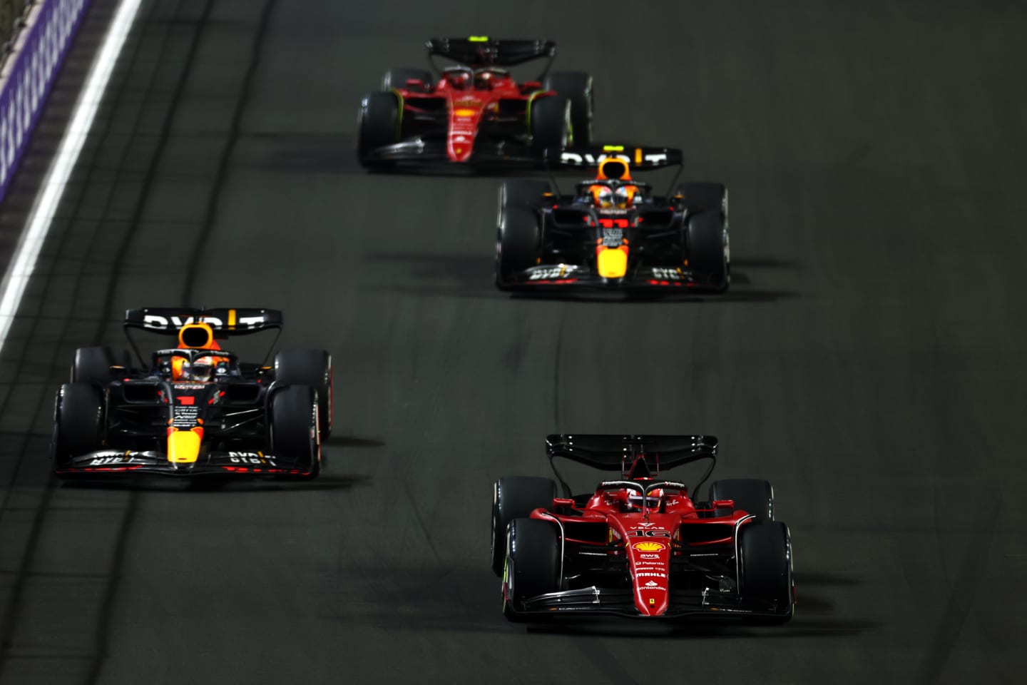 JEDDAH, SAUDI ARABIA - MARCH 27: Charles Leclerc of Monaco driving (16) the Ferrari F1-75 leads Max
