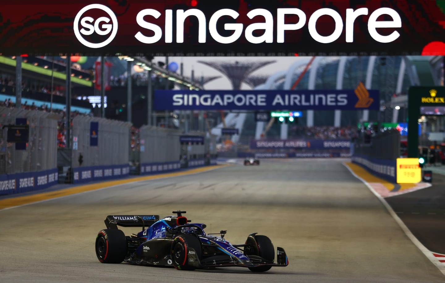 SINGAPORE, SINGAPORE - SEPTEMBER 30: Alexander Albon of Thailand driving the (23) Williams FW44