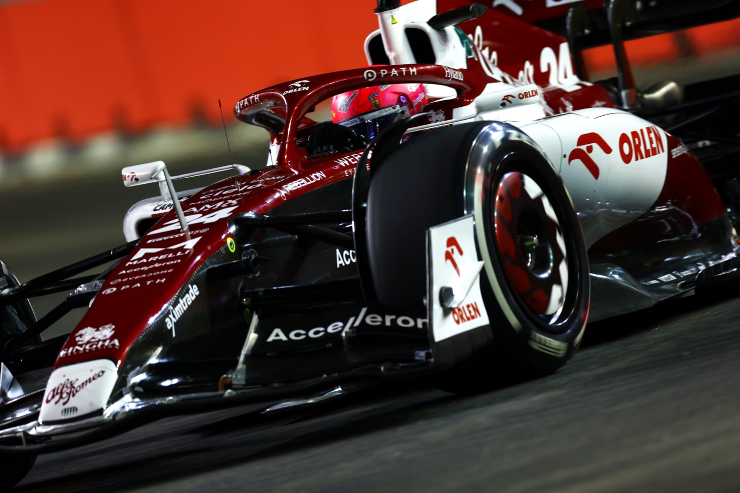 SINGAPORE, SINGAPORE - SEPTEMBER 30: Zhou Guanyu of China driving the (24) Alfa Romeo F1 C42 Ferrari on track during practice ahead of the F1 Grand Prix of Singapore at Marina Bay Street Circuit on September 30, 2022 in Singapore, Singapore. (Photo by Mark Thompson/Getty Images,)
