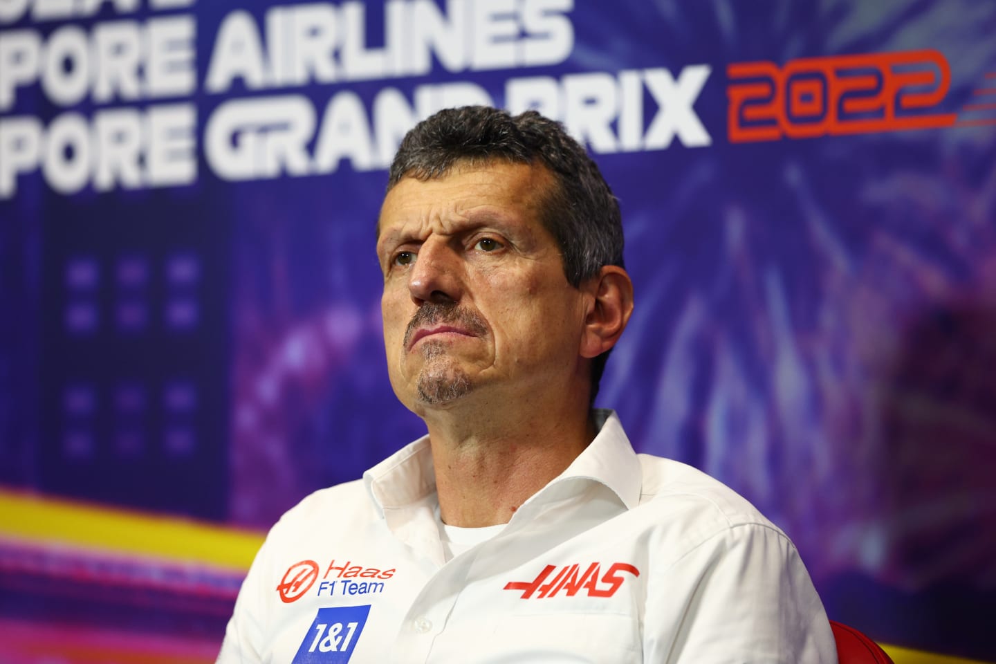SINGAPORE, SINGAPORE - OCTOBER 01: Haas F1 Team Principal Guenther Steiner talks in the team principal's press conference before final practice ahead of the F1 Grand Prix of Singapore at Marina Bay Street Circuit on October 01, 2022 in Singapore, Singapore. (Photo by Clive Rose/Getty Images,)