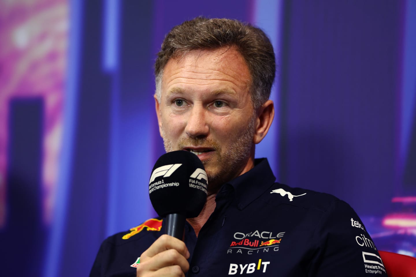 SINGAPORE, SINGAPORE - OCTOBER 01: Red Bull Racing Team Principal Christian Horner talks in the team principal's press conference before final practice ahead of the F1 Grand Prix of Singapore at Marina Bay Street Circuit on October 01, 2022 in Singapore, Singapore. (Photo by Clive Rose/Getty Images,)