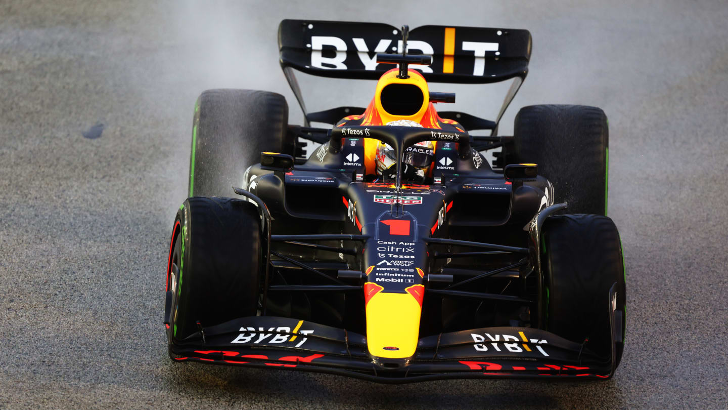 SINGAPORE, SINGAPORE - OCTOBER 01: Max Verstappen of the Netherlands driving the (1) Oracle Red