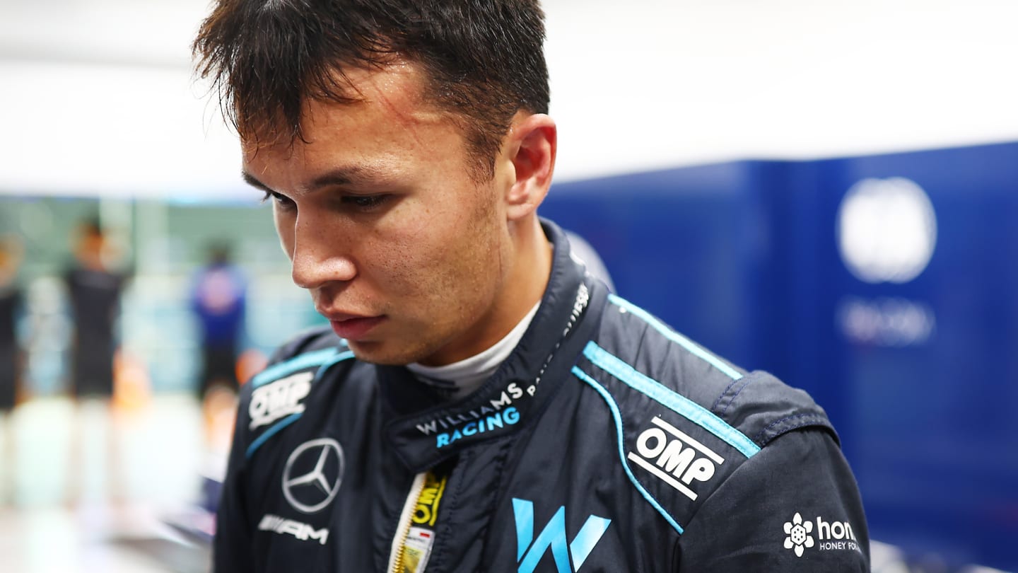 SINGAPORE, SINGAPORE - OCTOBER 01: Nineteenth placed qualifier Alexander Albon of Thailand and Williams is weighed in the FIA garage during qualifying ahead of the F1 Grand Prix of Singapore at Marina Bay Street Circuit on October 01, 2022 in Singapore, Singapore. (Photo by Dan Istitene - Formula 1/Formula 1 via Getty Images)