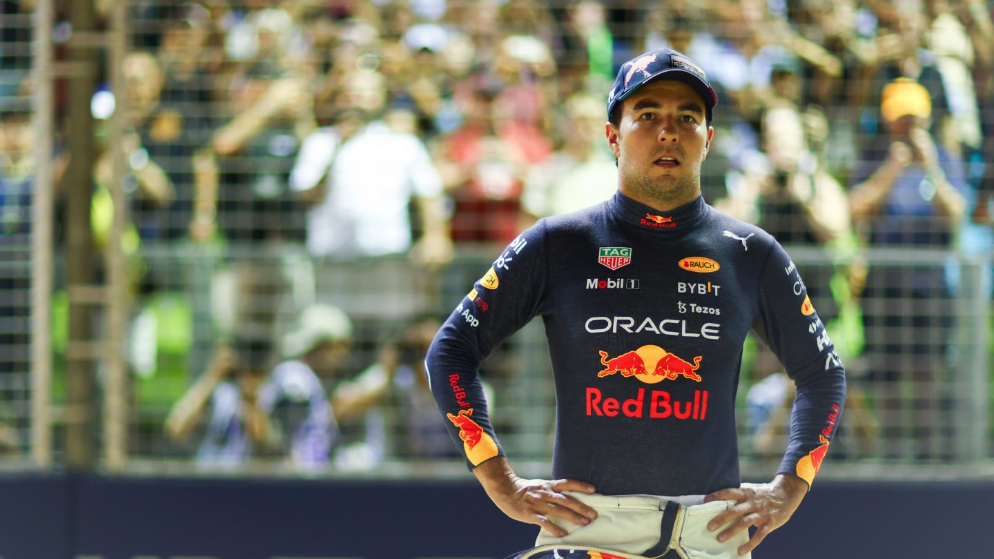 SINGAPORE, SINGAPORE - OCTOBER 01: Second placed qualifier Sergio Perez of Mexico and Oracle Red Bull Racing looks on in parc ferme during qualifying ahead of the F1 Grand Prix of Singapore at Marina Bay Street Circuit on October 01, 2022 in Singapore, Singapore. (Photo by Dan Istitene - Formula 1/Formula 1 via Getty Images)