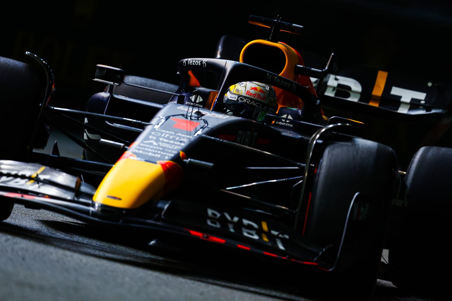SINGAPORE, SINGAPORE - OCTOBER 01: Max Verstappen of the Netherlands driving the (1) Oracle Red Bull Racing RB18 on track during qualifying ahead of the F1 Grand Prix of Singapore at Marina Bay Street Circuit on October 01, 2022 in Singapore, Singapore. (Photo by Clive Rose/Getty Images,)