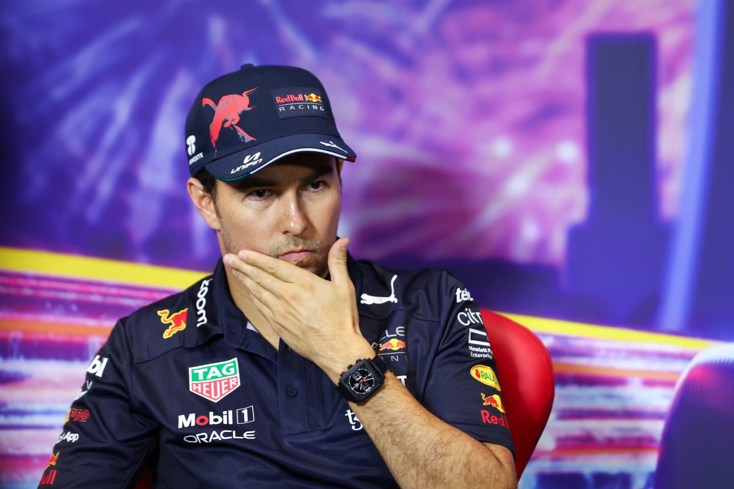 SINGAPORE, SINGAPORE - OCTOBER 01: Second placed qualifier Sergio Perez of Mexico and Oracle Red Bull Racing attends the press conference after qualifying ahead of the F1 Grand Prix of Singapore at Marina Bay Street Circuit on October 01, 2022 in Singapore, Singapore. (Photo by Dan Istitene/Getty Images)