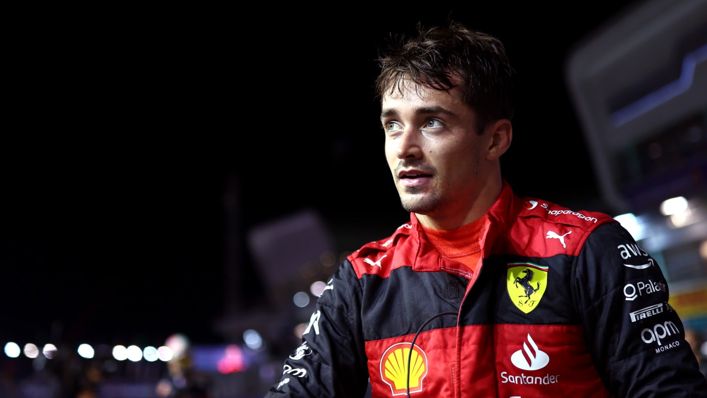 SINGAPORE, SINGAPORE - OCTOBER 01: Pole position qualifier Charles Leclerc of Monaco and Ferrari looks on in parc ferme during qualifying ahead of the F1 Grand Prix of Singapore at Marina Bay Street Circuit on October 01, 2022 in Singapore, Singapore. (Photo by Dan Istitene - Formula 1/Formula 1 via Getty Images)