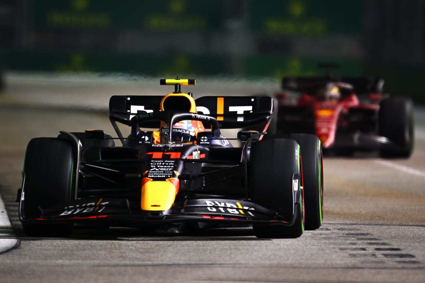 SINGAPORE, SINGAPORE - OCTOBER 02: Sergio Perez of Mexico driving the (11) Oracle Red Bull Racing