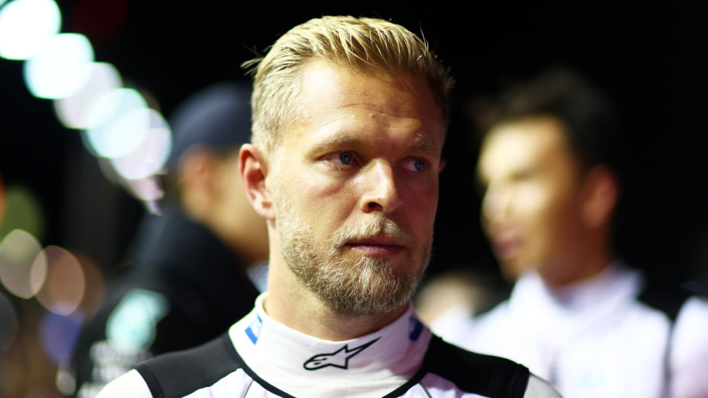 SINGAPORE, SINGAPORE - OCTOBER 02: Kevin Magnussen of Denmark and Haas F1 looks on from the grid during the F1 Grand Prix of Singapore at Marina Bay Street Circuit on October 02, 2022 in Singapore, Singapore. (Photo by Dan Istitene - Formula 1/Formula 1 via Getty Images)
