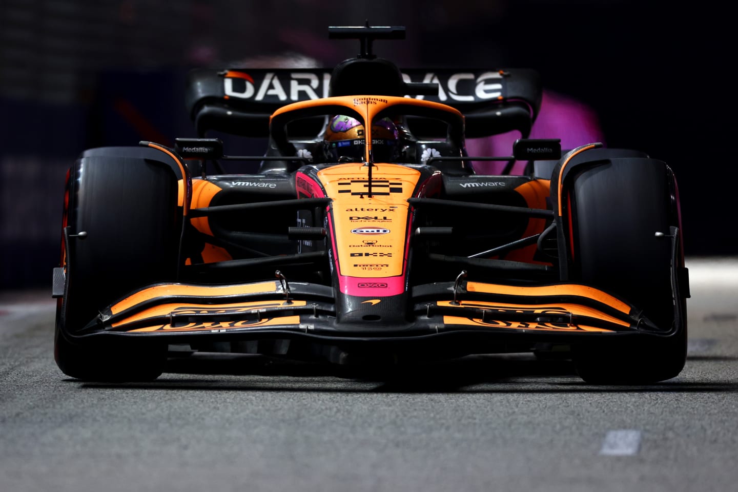 SINGAPORE, SINGAPORE - OCTOBER 02: Daniel Ricciardo of Australia driving the (3) McLaren MCL36