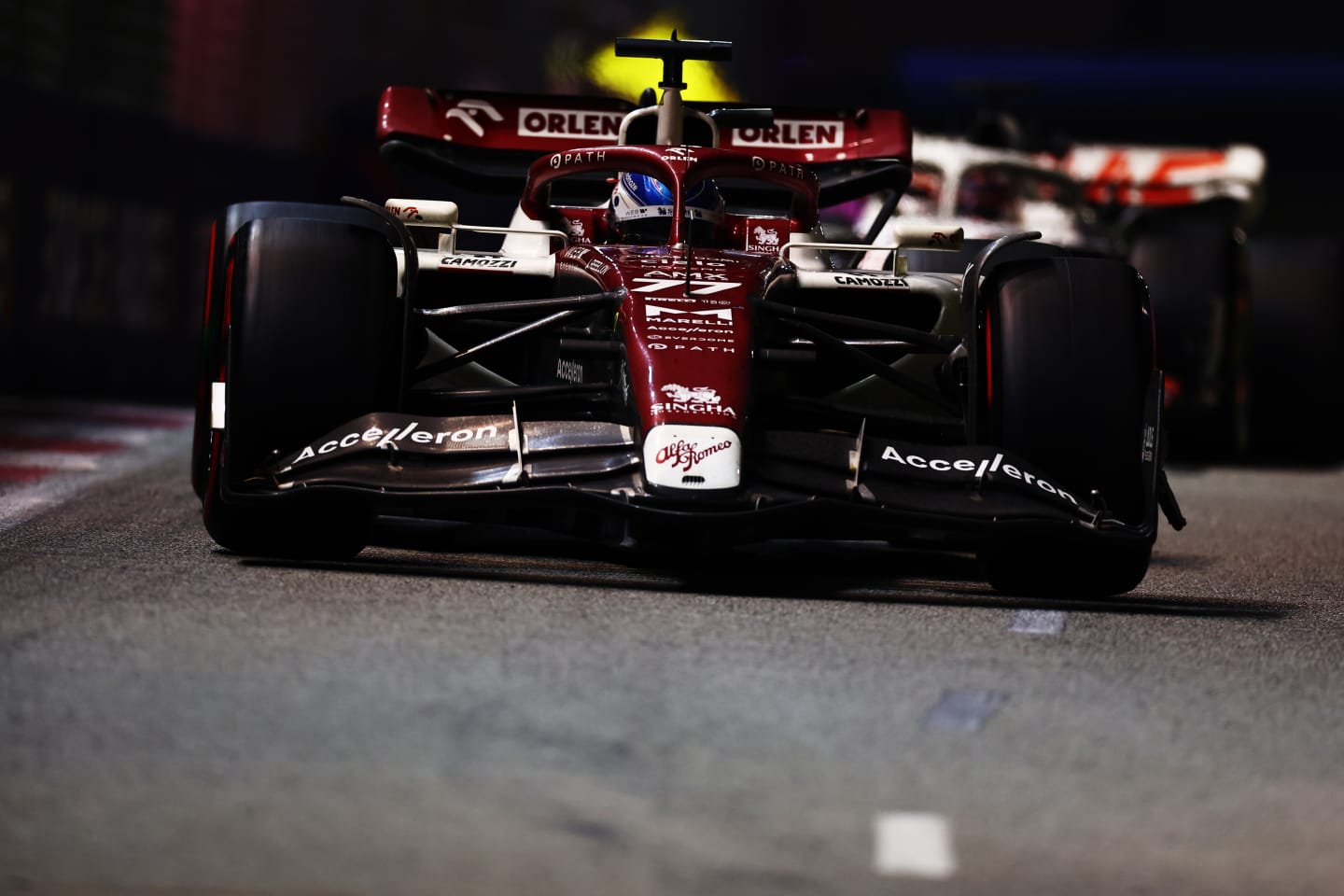 SINGAPORE, SINGAPORE - OCTOBER 02: Valtteri Bottas of Finland driving the (77) Alfa Romeo F1 C42 Ferrari on track during the F1 Grand Prix of Singapore at Marina Bay Street Circuit on October 02, 2022 in Singapore, Singapore. (Photo by Mark Thompson/Getty Images,)