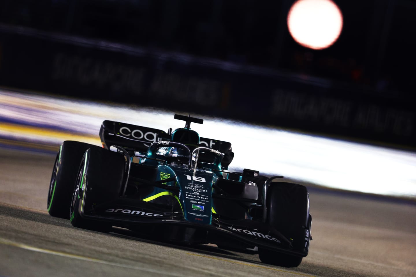 SINGAPORE, SINGAPORE - OCTOBER 02: Lance Stroll of Canada driving the (18) Aston Martin AMR22 Mercedes on track during the F1 Grand Prix of Singapore at Marina Bay Street Circuit on October 02, 2022 in Singapore, Singapore. (Photo by Clive Rose/Getty Images,)