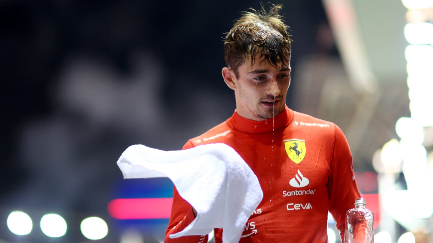 SINGAPORE, SINGAPORE - OCTOBER 02: Second placed Charles Leclerc of Monaco and Ferrari looks on in parc ferme during the F1 Grand Prix of Singapore at Marina Bay Street Circuit on October 02, 2022 in Singapore, Singapore. (Photo by Dan Istitene - Formula 1/Formula 1 via Getty Images)