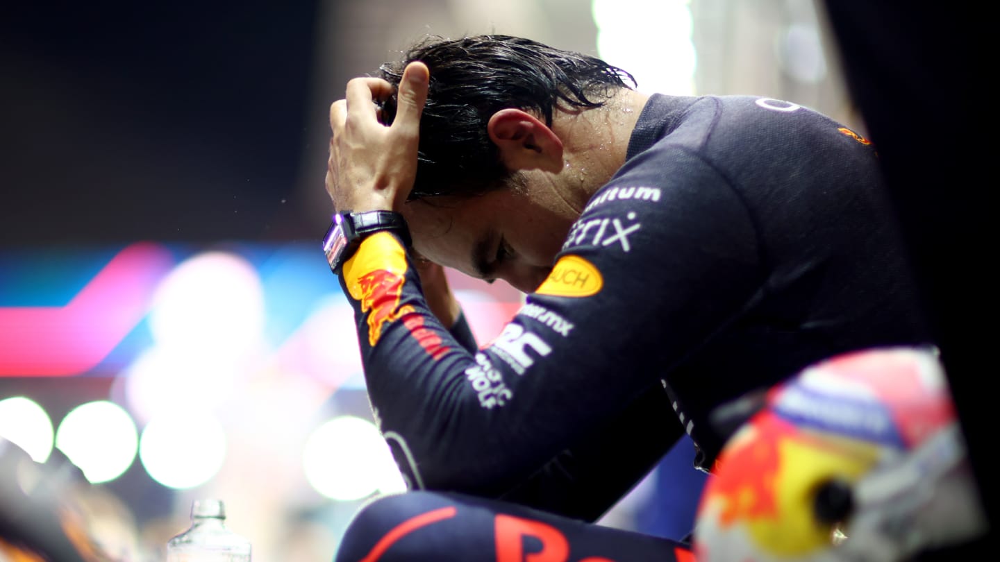 SINGAPORE, SINGAPORE - OCTOBER 02: Race winner Sergio Perez of Mexico and Oracle Red Bull Racing celebrates in parc ferme during the F1 Grand Prix of Singapore at Marina Bay Street Circuit on October 02, 2022 in Singapore, Singapore. (Photo by Dan Istitene - Formula 1/Formula 1 via Getty Images)