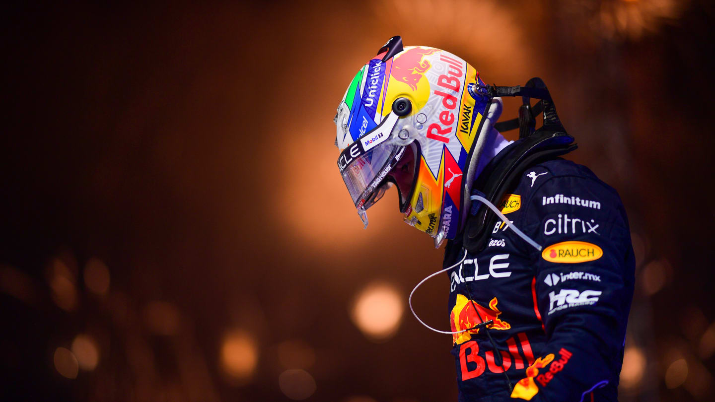 SINGAPORE, SINGAPORE - OCTOBER 02: Race winner Sergio Perez of Mexico and Oracle Red Bull Racing celebrates in parc ferme during the F1 Grand Prix of Singapore at Marina Bay Street Circuit on October 02, 2022 in Singapore, Singapore. (Photo by Mario Renzi - Formula 1/Formula 1 via Getty Images)