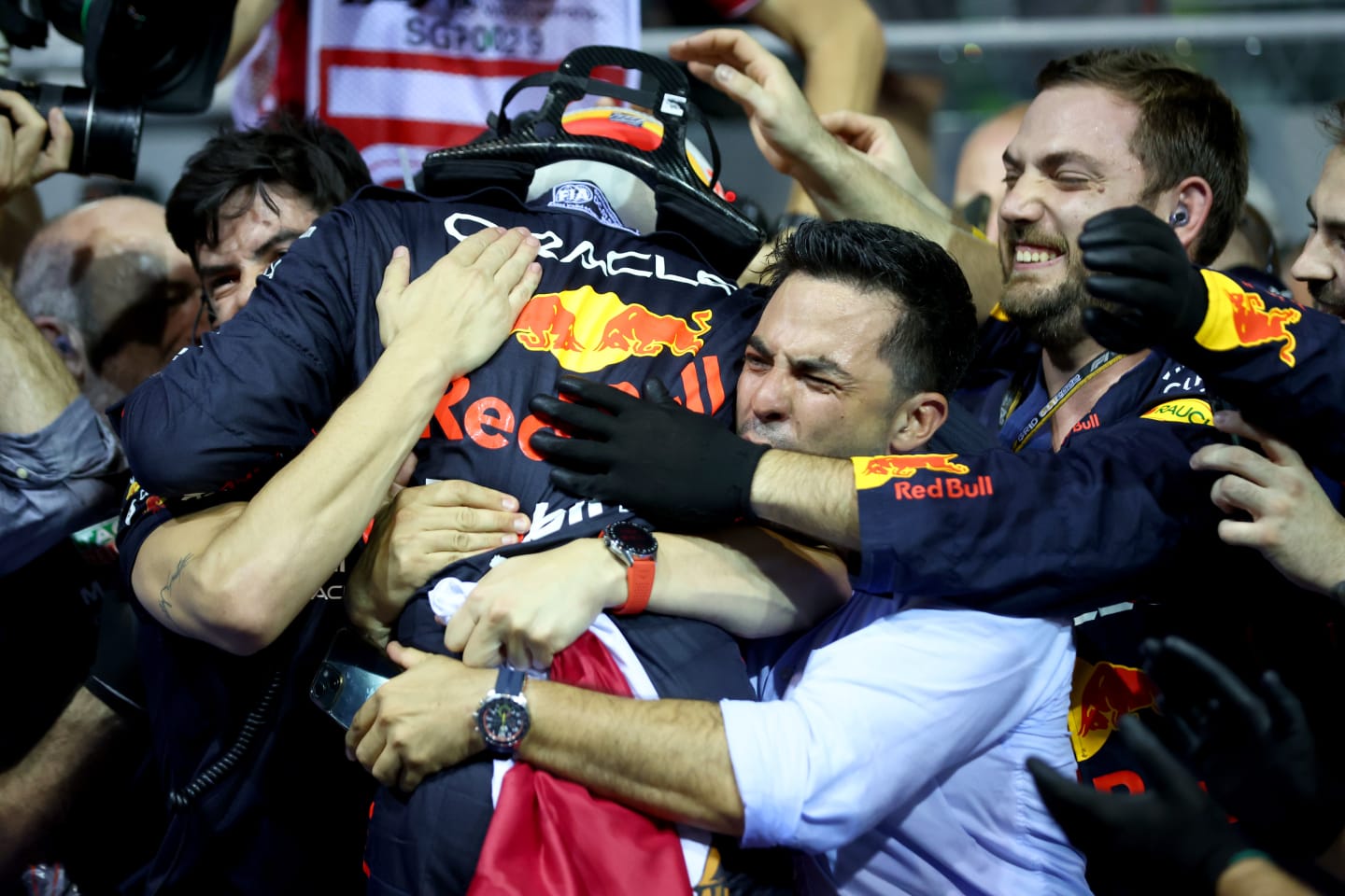 SINGAPORE, SINGAPORE - OCTOBER 02: Race winner Sergio Perez of Mexico and Oracle Red Bull Racing celebrates in parc ferme during the F1 Grand Prix of Singapore at Marina Bay Street Circuit on October 02, 2022 in Singapore, Singapore. (Photo by Dan Istitene - Formula 1/Formula 1 via Getty Images)