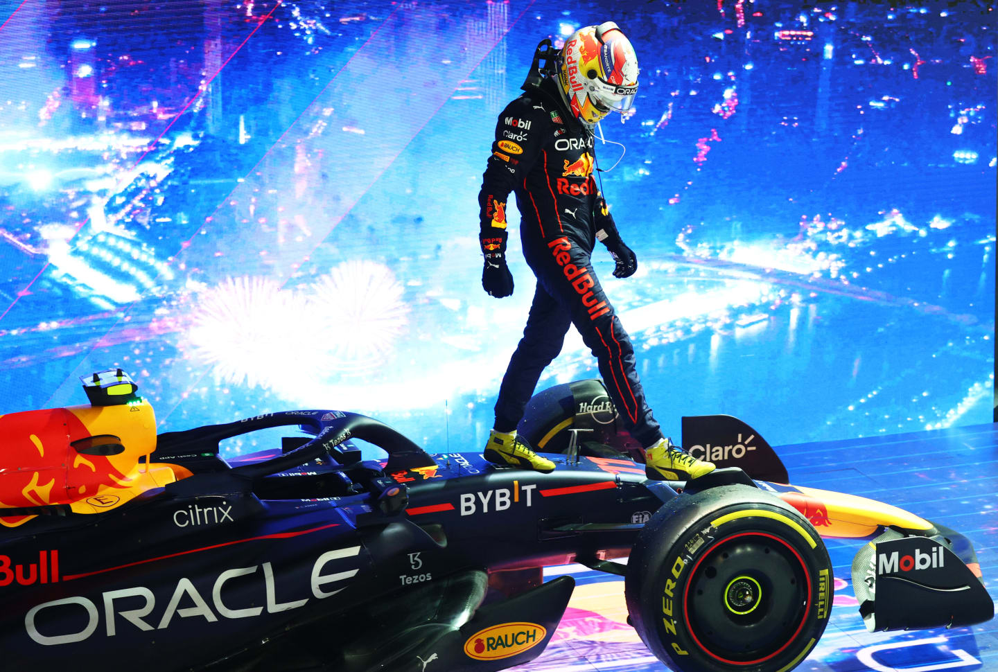 SINGAPORE, SINGAPORE - OCTOBER 02: Race winner Sergio Perez of Mexico and Oracle Red Bull Racing celebrates in parc ferme during the F1 Grand Prix of Singapore at Marina Bay Street Circuit on October 02, 2022 in Singapore, Singapore. (Photo by Clive Rose/Getty Images,)