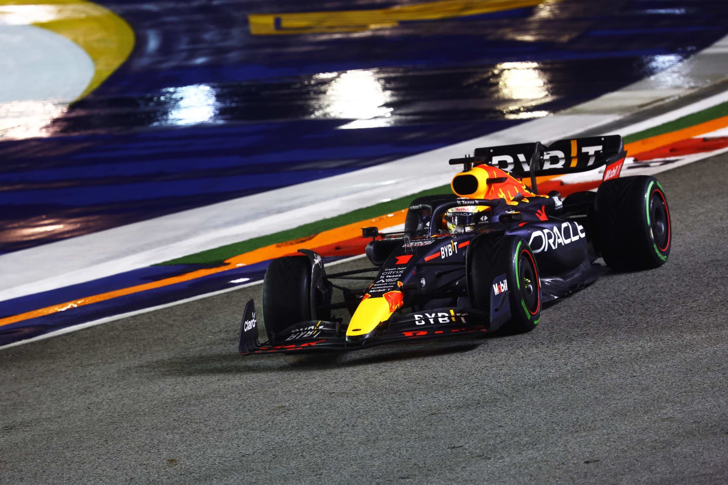 SINGAPORE, SINGAPORE - OCTOBER 02: Max Verstappen of the Netherlands driving the (1) Oracle Red