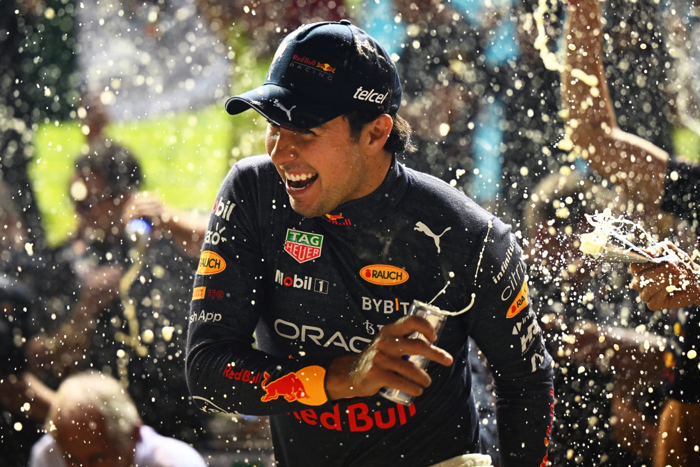 SINGAPORE, SINGAPORE - OCTOBER 02: Race winner Sergio Perez of Mexico and Oracle Red Bull Racing
