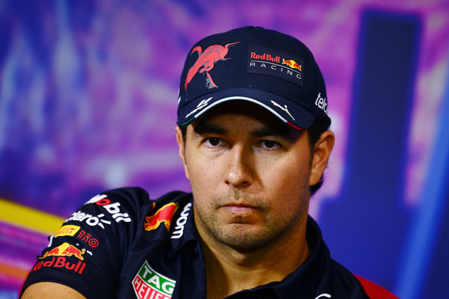 SINGAPORE, SINGAPORE - SEPTEMBER 29: Sergio Perez of Mexico and Oracle Red Bull Racing attends the Drivers Press Conference during previews ahead of the F1 Grand Prix of Singapore at Marina Bay Street Circuit on September 29, 2022 in Singapore, Singapore. (Photo by Clive Mason/Getty Images,)