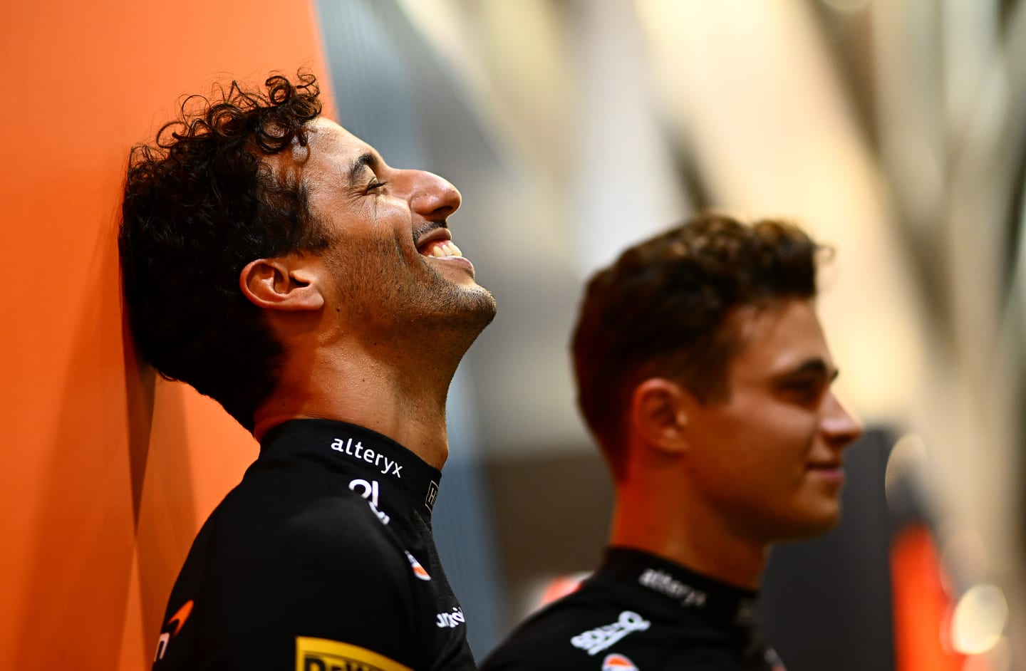 SINGAPORE, SINGAPORE - SEPTEMBER 29: Daniel Ricciardo of Australia and McLaren and Lando Norris of Great Britain and McLaren look on in the Paddock during previews ahead of the F1 Grand Prix of Singapore at Marina Bay Street Circuit on September 29, 2022 in Singapore, Singapore. (Photo by Clive Mason/Getty Images,)