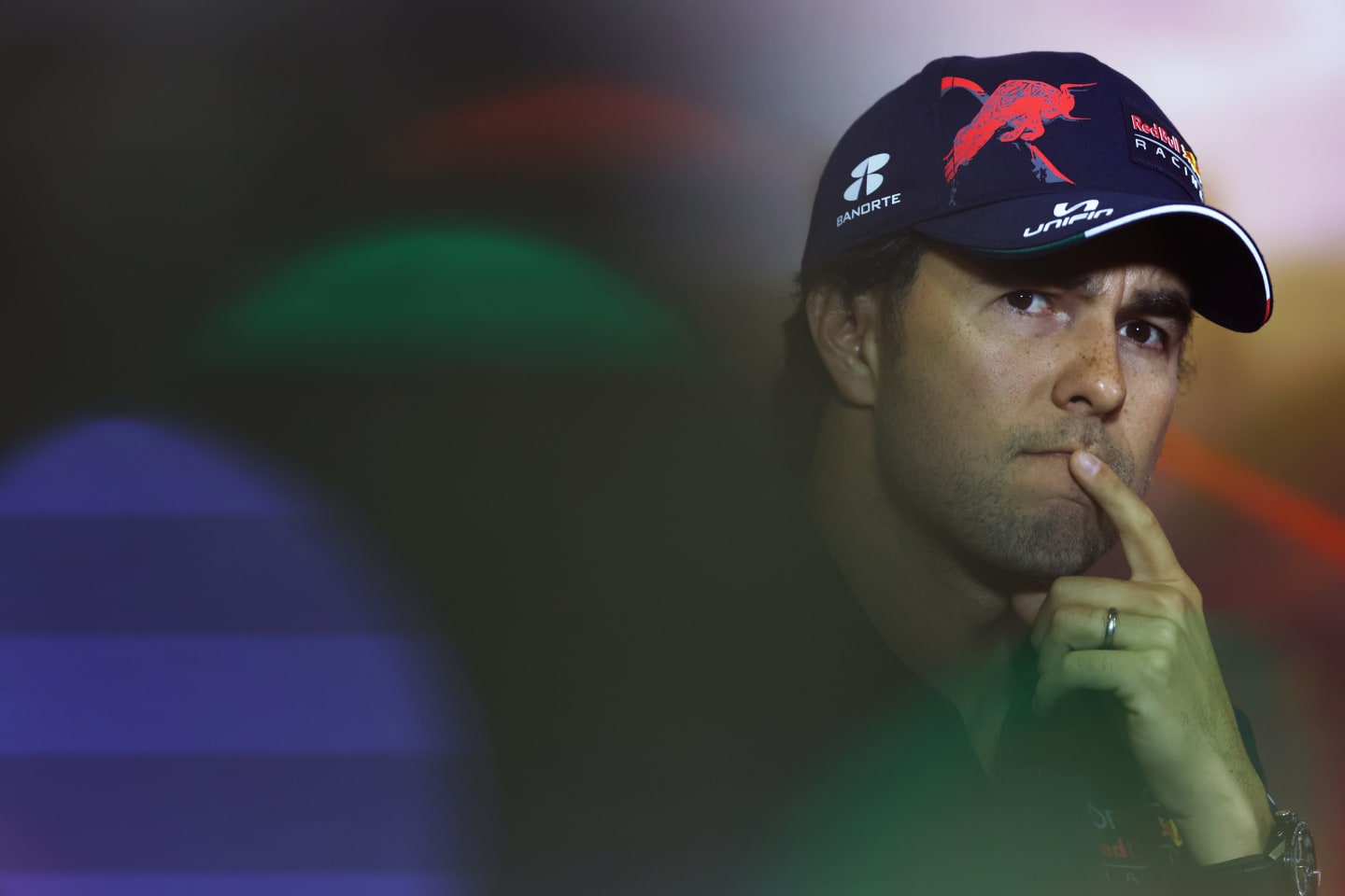 BARCELONA, SPAIN - MAY 20: Sergio Perez of Mexico and Oracle Red Bull Racing looks on in the Drivers Press Conference prior to practice ahead of the F1 Grand Prix of Spain at Circuit de Barcelona-Catalunya on May 20, 2022 in Barcelona, Spain. (Photo by Lars Baron/Getty Images)