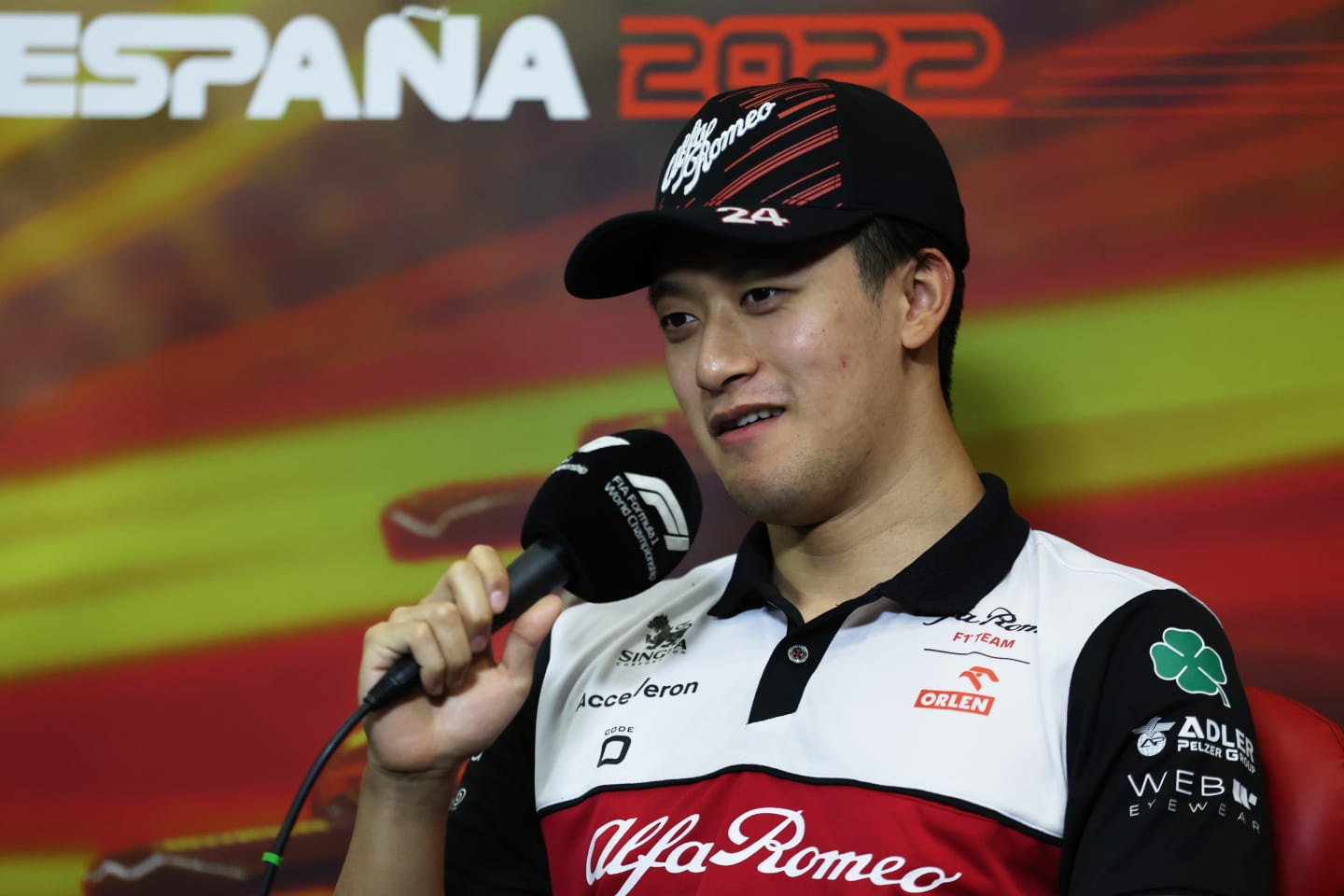 BARCELONA, SPAIN - MAY 20: Zhou Guanyu of China and Alfa Romeo F1 talks in the Drivers Press Conference prior to practice ahead of the F1 Grand Prix of Spain at Circuit de Barcelona-Catalunya on May 20, 2022 in Barcelona, Spain. (Photo by Bryn Lennon/Getty Images)