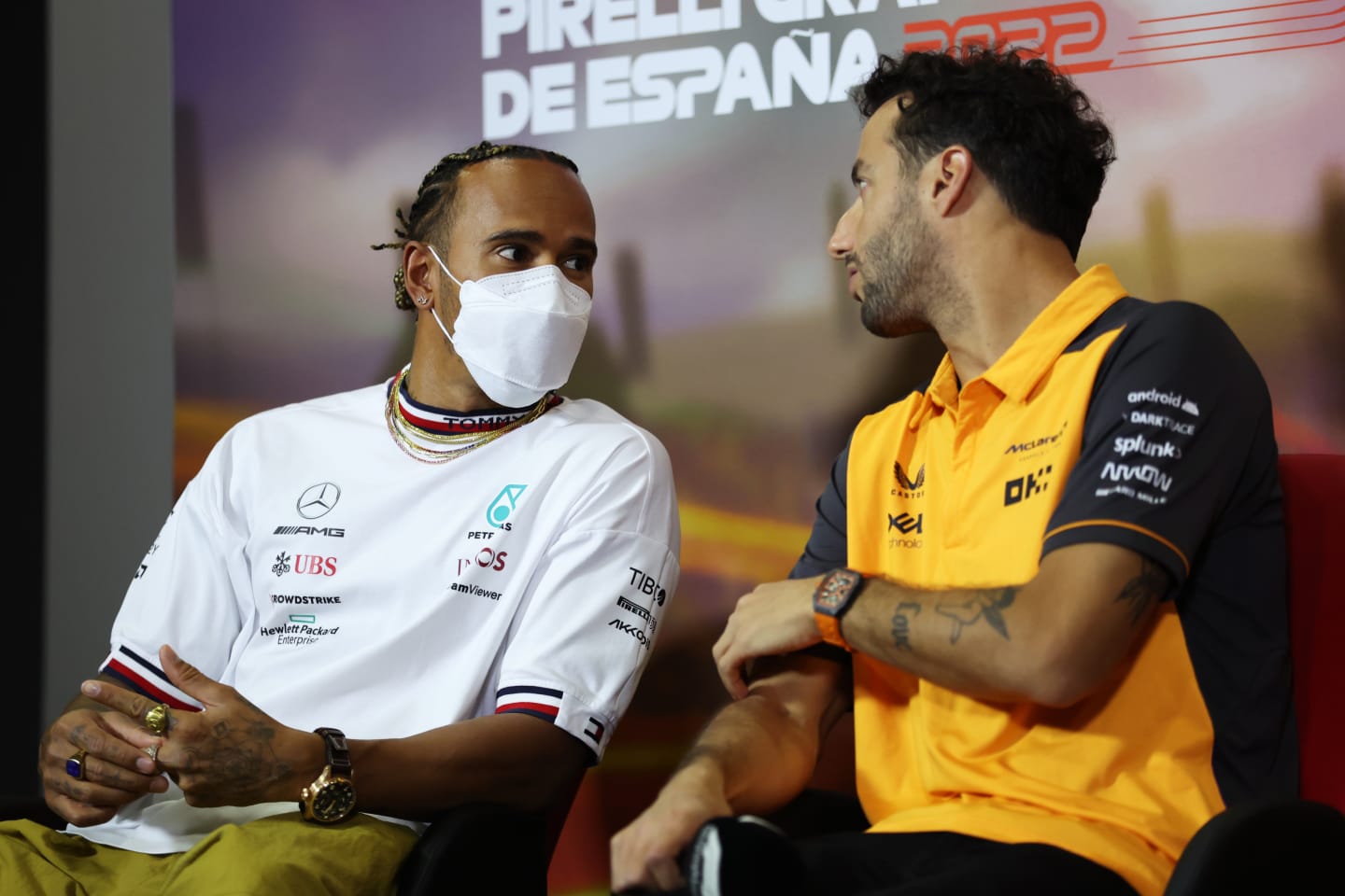 BARCELONA, SPAIN - MAY 20: Lewis Hamilton of Great Britain and Mercedes and Daniel Ricciardo of Australia and McLaren talk in the Drivers Press Conference prior to practice ahead of the F1 Grand Prix of Spain at Circuit de Barcelona-Catalunya on May 20, 2022 in Barcelona, Spain. (Photo by Bryn Lennon/Getty Images)