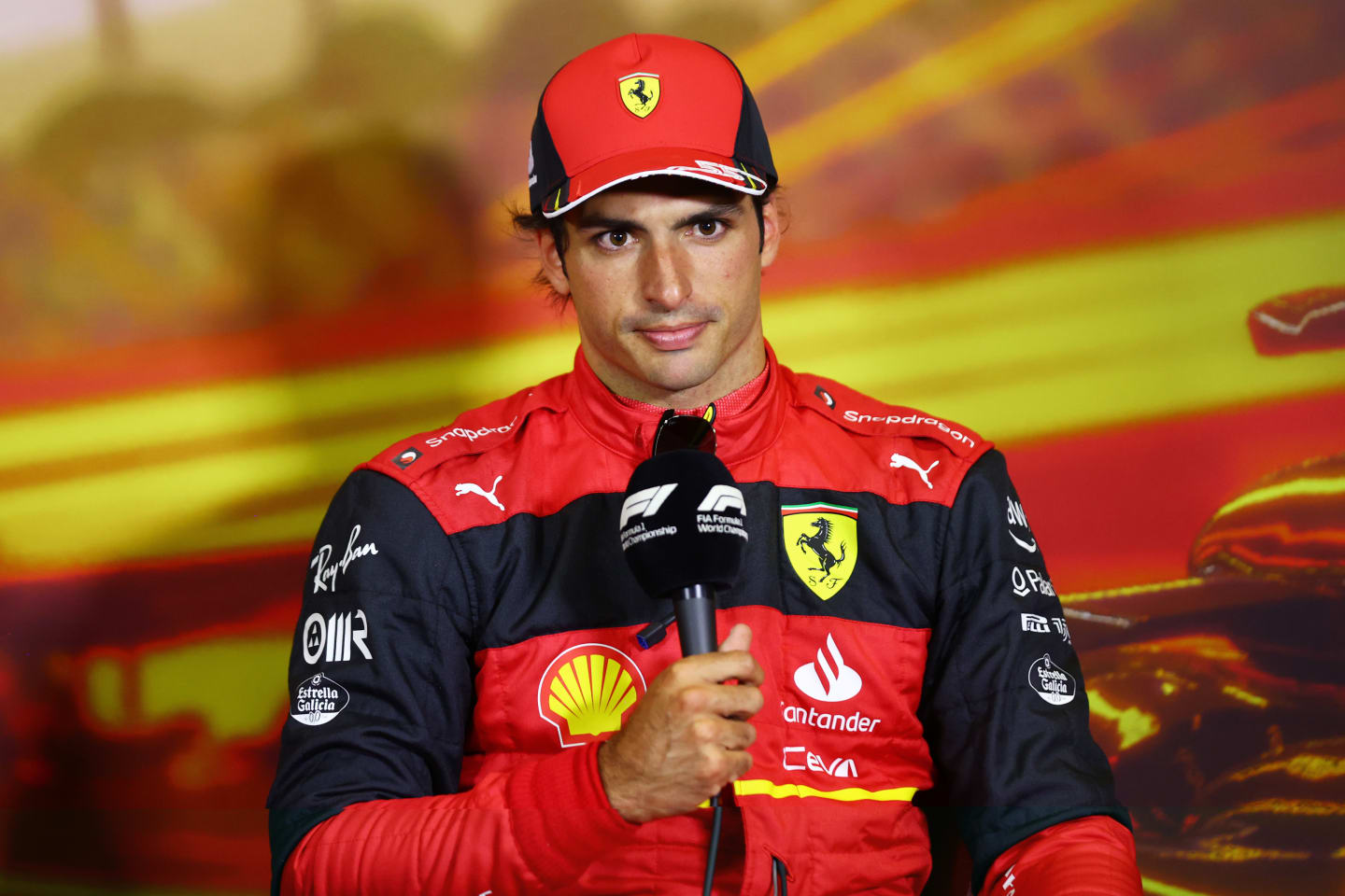 BARCELONA, SPAIN - MAY 21: Third placed qualifier Carlos Sainz of Spain and Ferrari talks in the press conference after qualifying ahead of the F1 Grand Prix of Spain at Circuit de Barcelona-Catalunya on May 21, 2022 in Barcelona, Spain. (Photo by Dan Istitene - Formula 1/Formula 1 via Getty Images)