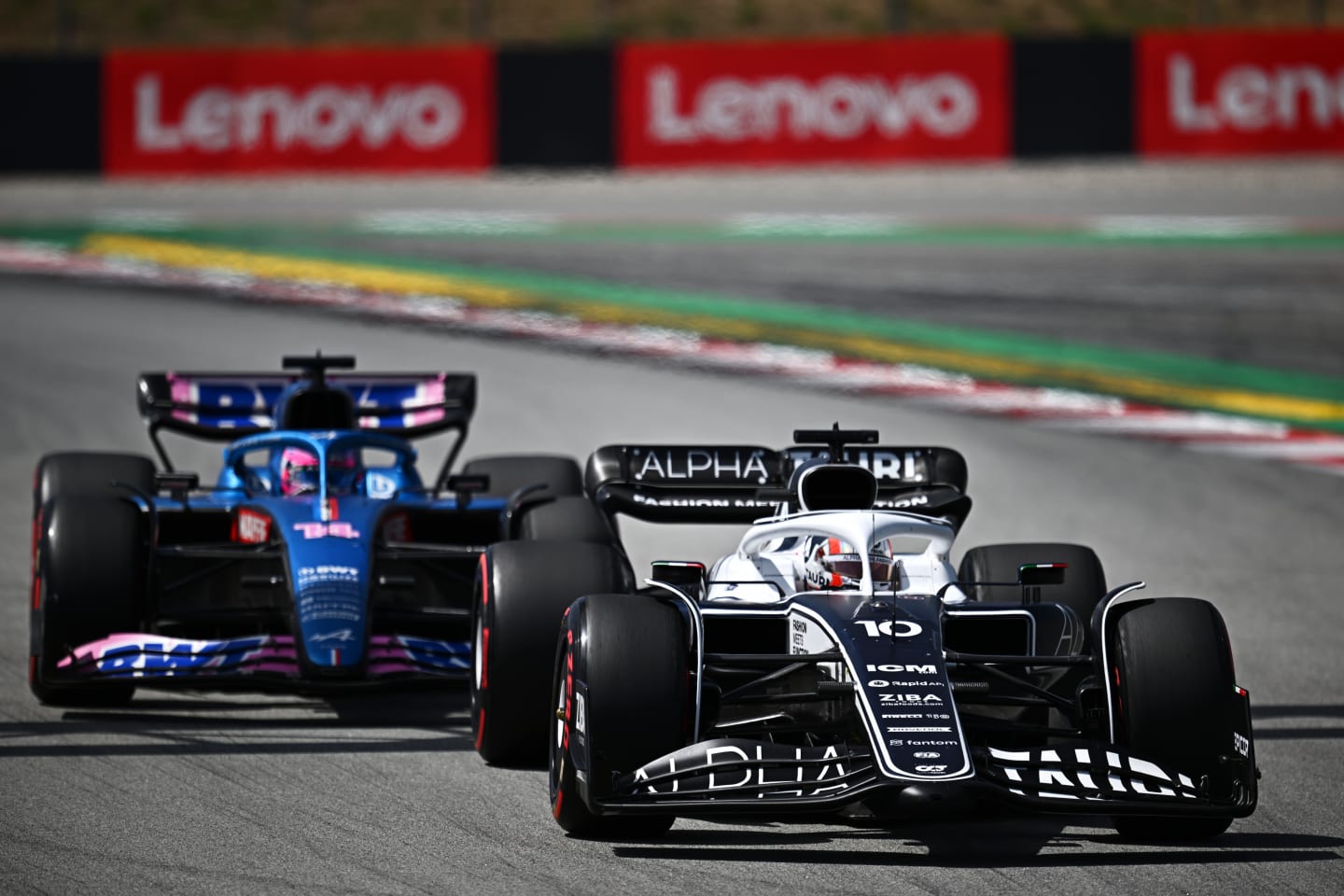 BARCELONA, SPAIN - MAY 22: Pierre Gasly of France driving the (10) Scuderia AlphaTauri AT03 leads