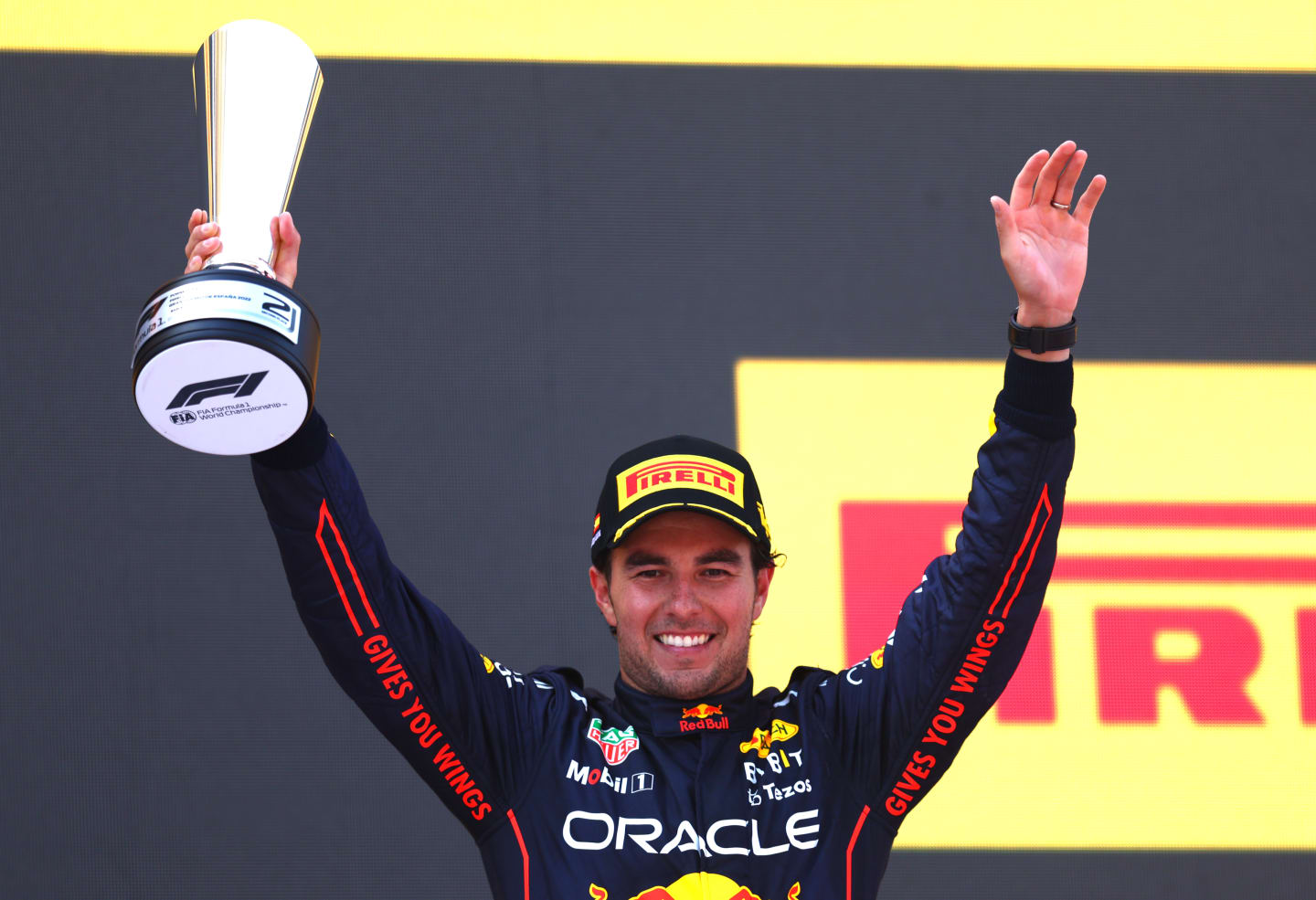 BARCELONA, SPAIN - MAY 22: Second placed Sergio Perez of Mexico and Oracle Red Bull Racing celebrates on the podium during the F1 Grand Prix of Spain at Circuit de Barcelona-Catalunya on May 22, 2022 in Barcelona, Spain. (Photo by Alex Pantling - Formula 1/Formula 1 via Getty Images)