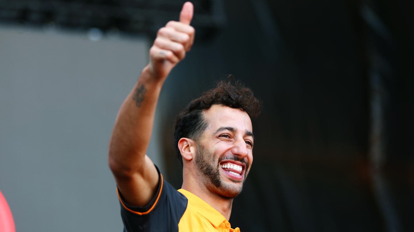AUSTIN, TEXAS - OCTOBER 21: Daniel Ricciardo of Australia and McLaren greets the crowd on the fan