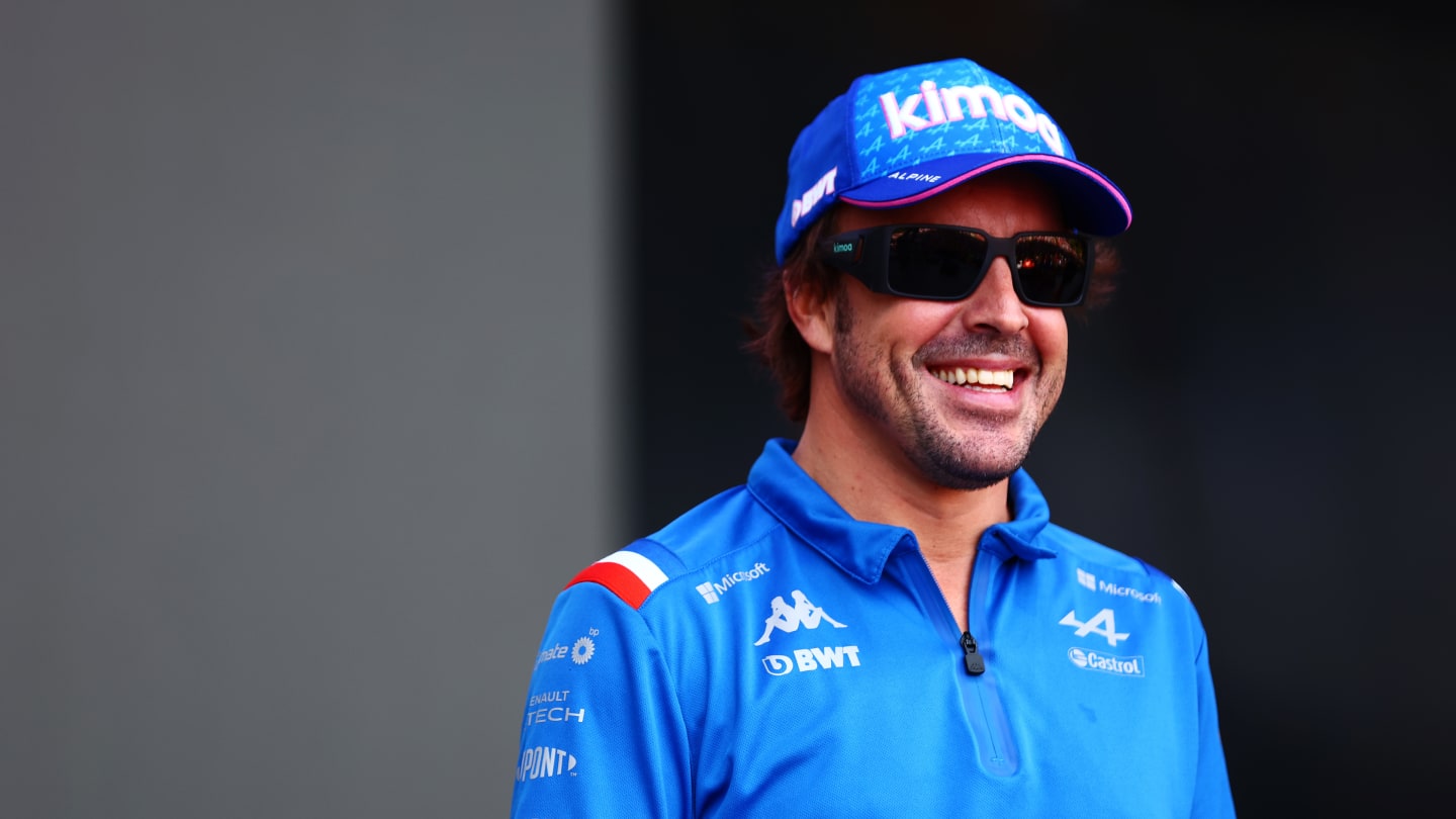 AUSTIN, TEXAS - OCTOBER 22: Fernando Alonso of Spain and Alpine F1 greets the crowd on the fan stage prior to final practice ahead of the F1 Grand Prix of USA at Circuit of The Americas on October 22, 2022 in Austin, Texas. (Photo by Dan Istitene - Formula 1/Formula 1 via Getty Images)