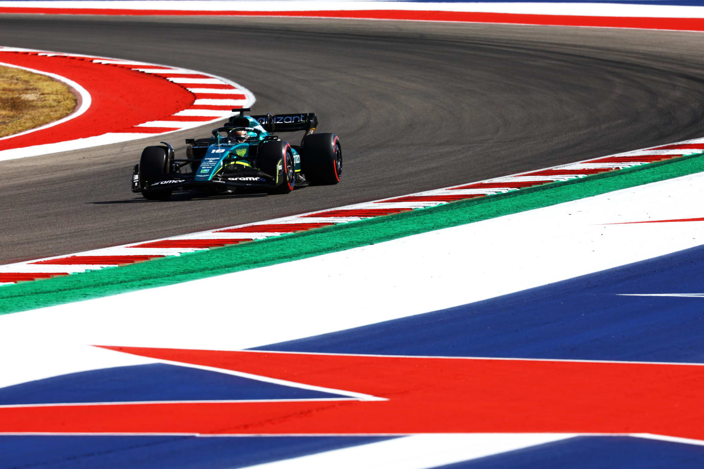 AUSTIN, TEXAS - OCTOBER 22: Lance Stroll of Canada driving the (18) Aston Martin AMR22 Mercedes on