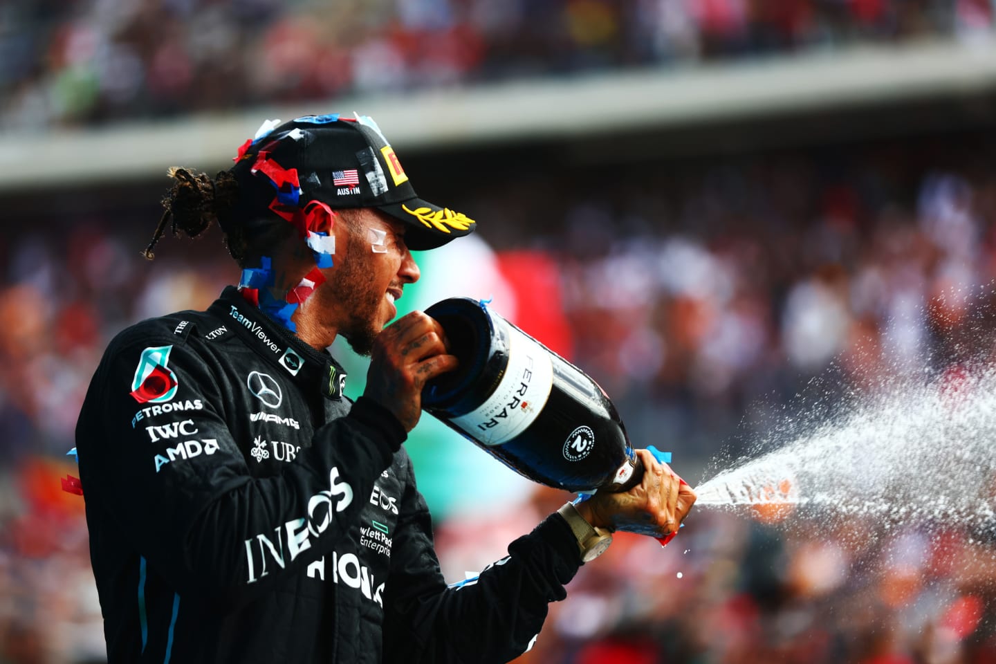 AUSTIN, TEXAS - OCTOBER 23: Second placed Lewis Hamilton of Great Britain and Mercedes celebrates on the podium following the F1 Grand Prix of USA at Circuit of The Americas on October 23, 2022 in Austin, Texas. (Photo by Dan Istitene - Formula 1/Formula 1 via Getty Images)