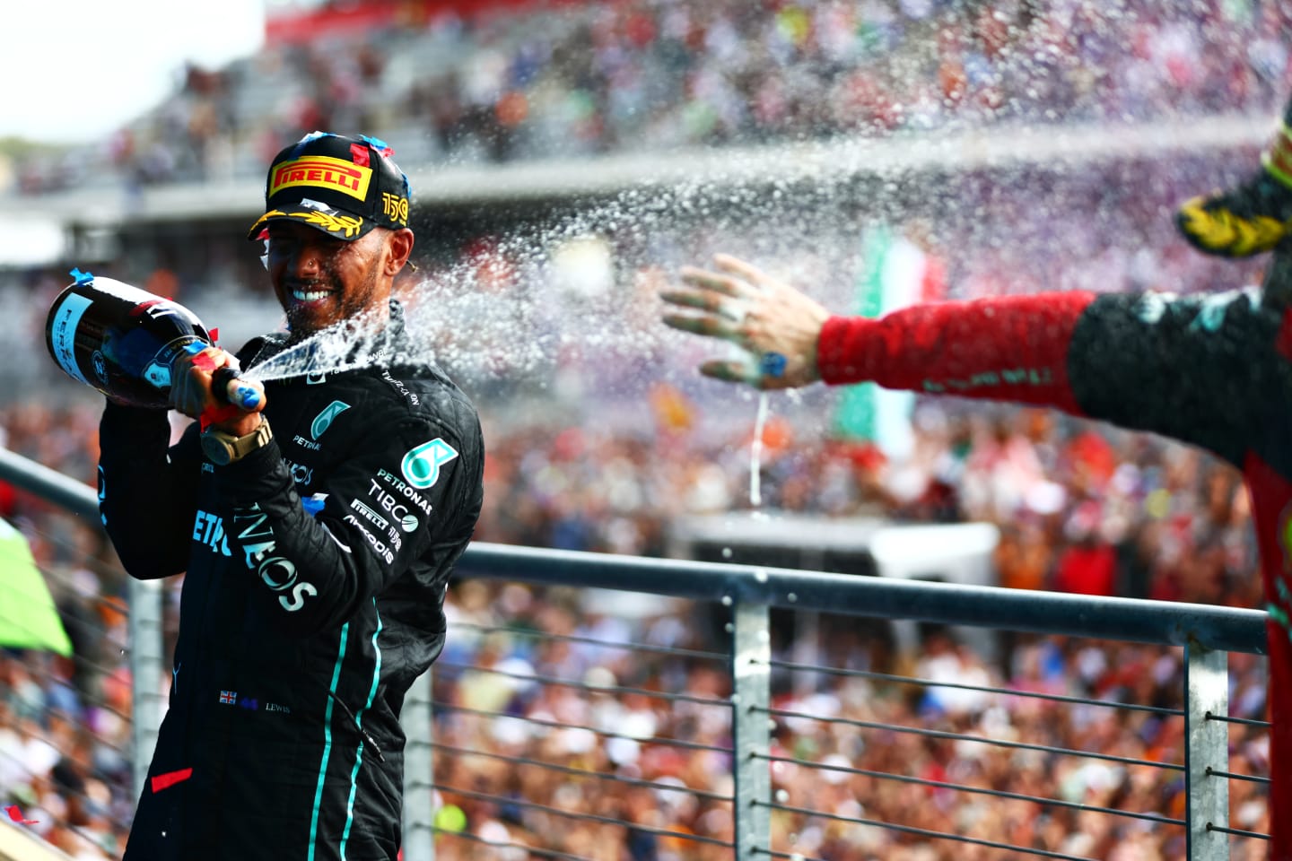 AUSTIN, TEXAS - OCTOBER 23: Second placed Lewis Hamilton of Great Britain and Mercedes celebrates on the podium following the F1 Grand Prix of USA at Circuit of The Americas on October 23, 2022 in Austin, Texas. (Photo by Dan Istitene - Formula 1/Formula 1 via Getty Images)
