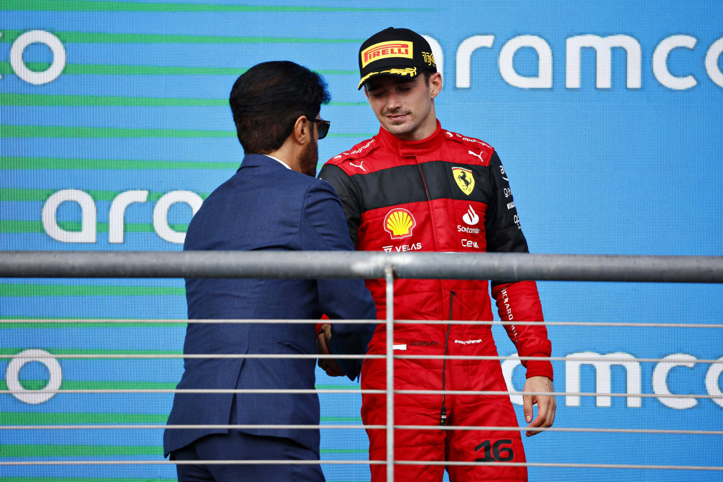 AUSTIN, TEXAS - OCTOBER 23: Third placed Charles Leclerc of Monaco and Ferrari celebrates on the podium following the F1 Grand Prix of USA at Circuit of The Americas on October 23, 2022 in Austin, Texas. (Photo by Chris Graythen/Getty Images)