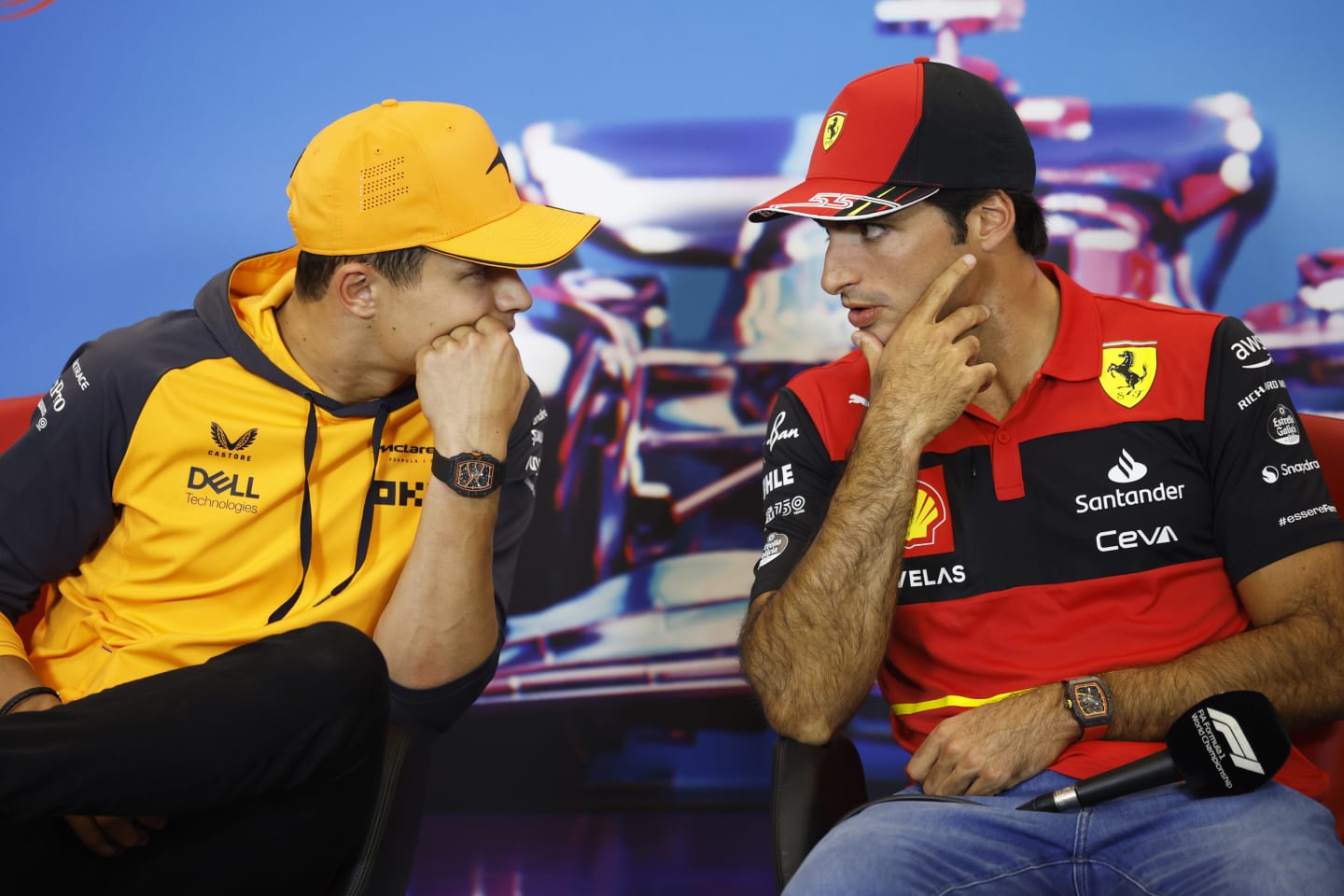 AUSTIN, TEXAS - OCTOBER 20: Lando Norris of Great Britain and McLaren and Carlos Sainz of Spain and Ferrari talk in the Drivers Press Conference during previews ahead of the F1 Grand Prix of USA at Circuit of The Americas on October 20, 2022 in Austin, Texas. (Photo by Jared C. Tilton/Getty Images)