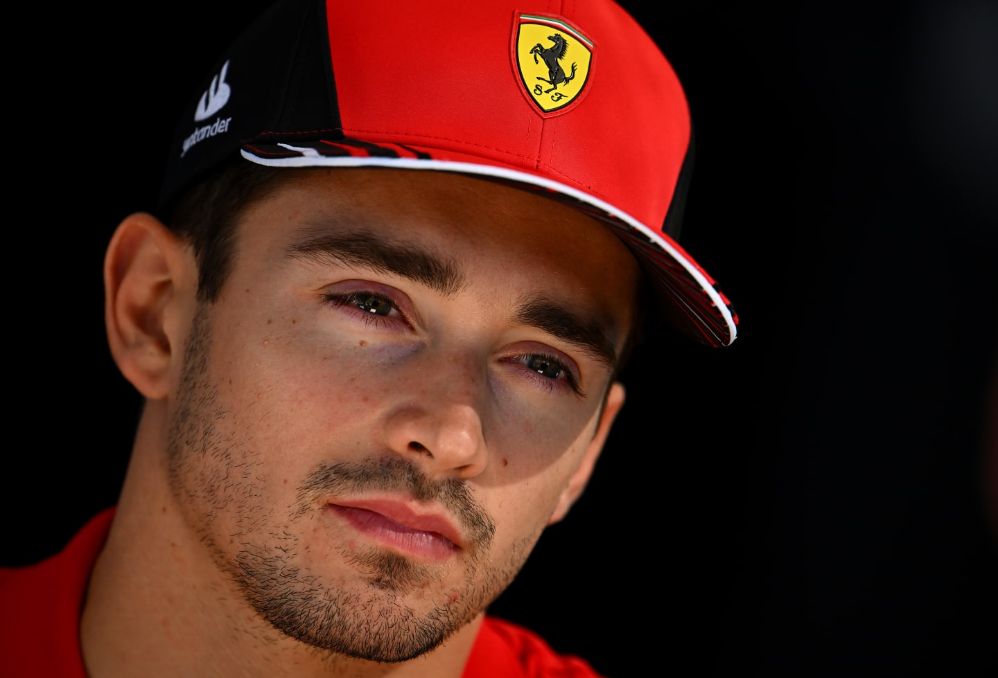 AUSTIN, TEXAS - OCTOBER 20: Charles Leclerc of Monaco and Ferrari looks on in the Paddock during