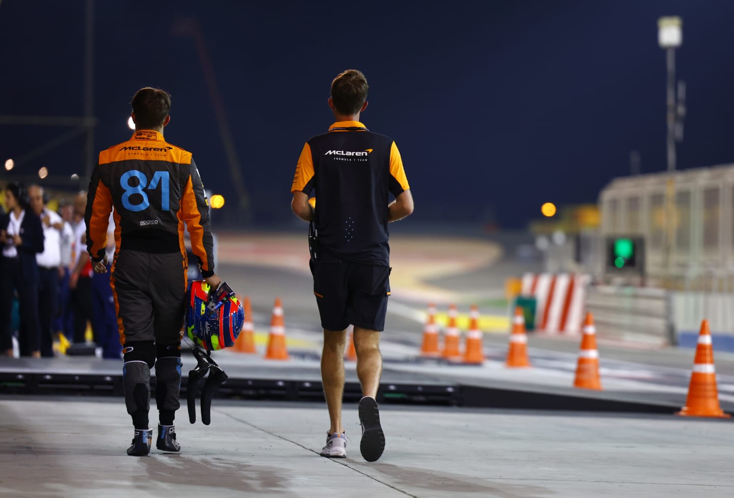 BAHRAIN, BAHRAIN - MARCH 04: 18th placed qualifier Oscar Piastri of Australia and McLaren walks in the Pitlane during qualifying ahead of the F1 Grand Prix of Bahrain at Bahrain International Circuit on March 04, 2023 in Bahrain, Bahrain. (Photo by Mark Thompson/Getty Images)