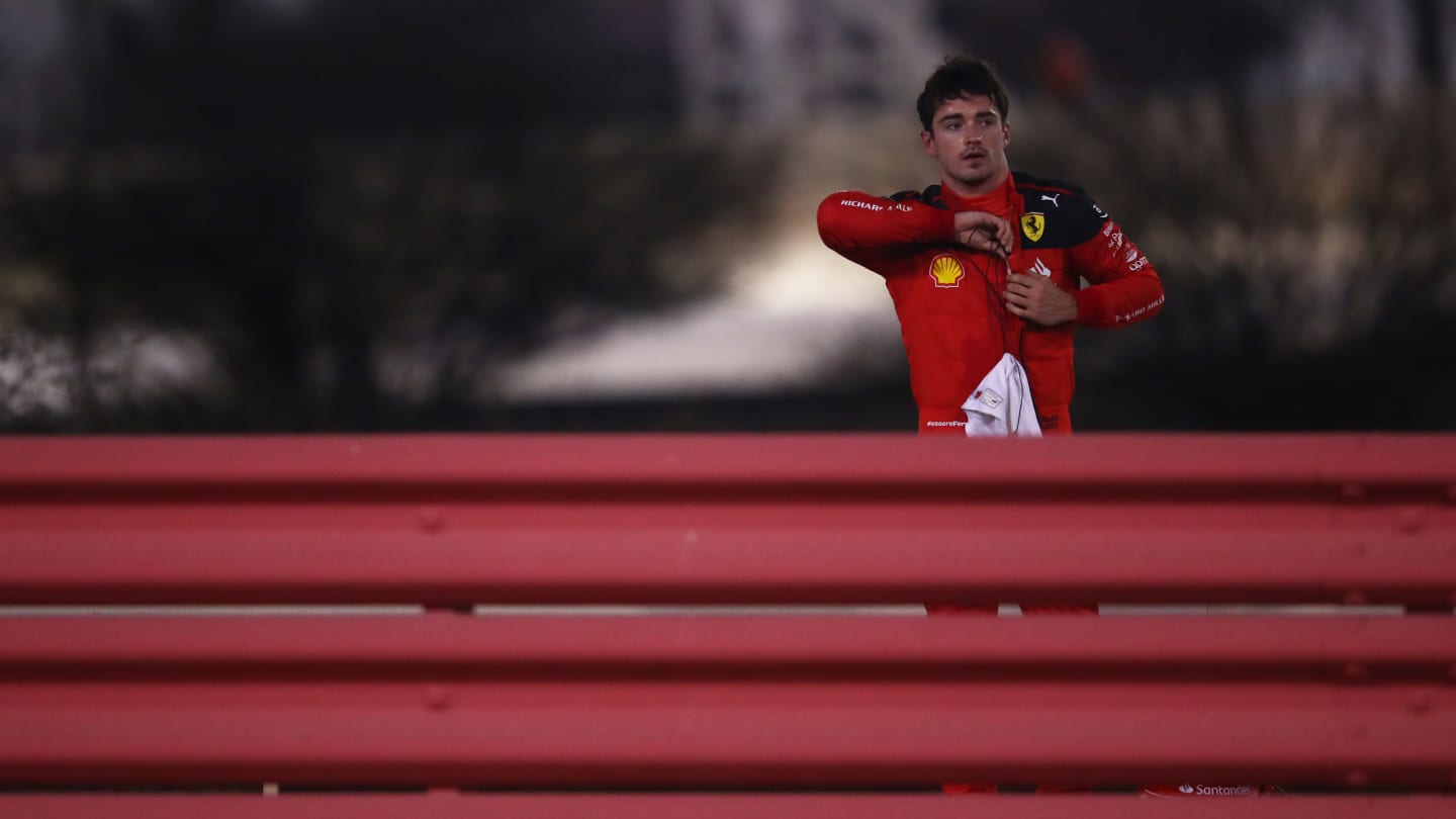 BAHRAIN, BAHRAIN - MARCH 05: Charles Leclerc of Monaco and Ferrari looks on after retiring from the