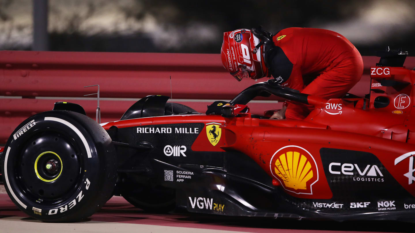 BAHRAIN, BAHRAIN - MARCH 05: Charles Leclerc of Monaco and Ferrari climbs from his car after retiring from the race during the F1 Grand Prix of Bahrain at Bahrain International Circuit on March 05, 2023 in Bahrain, Bahrain. (Photo by Joe Portlock - Formula 1/Formula 1 via Getty Images)