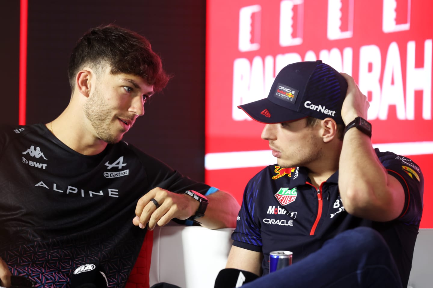 BAHRAIN, BAHRAIN - MARCH 02: Pierre Gasly of France and Alpine F1 and Max Verstappen of the Netherlands and Oracle Red Bull Racing talk in the Drivers Press Conference during previews ahead of the F1 Grand Prix of Bahrain at Bahrain International Circuit on March 02, 2023 in Bahrain, Bahrain. (Photo by Lars Baron/Getty Images)