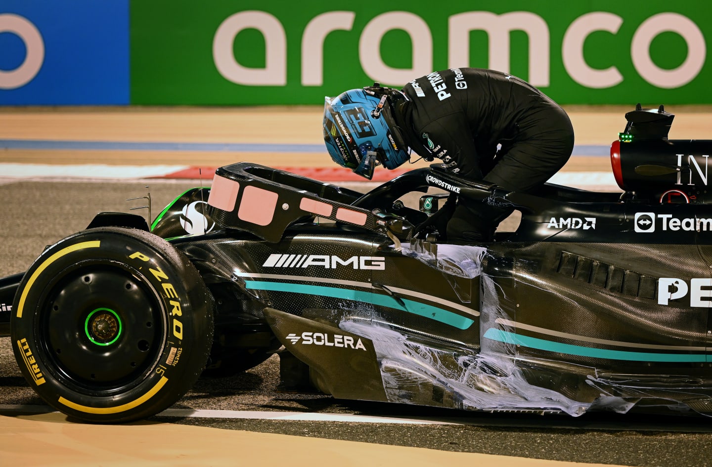 BAHRAIN, BAHRAIN - FEBRUARY 24: George Russell of Great Britain and Mercedes climbs from his car