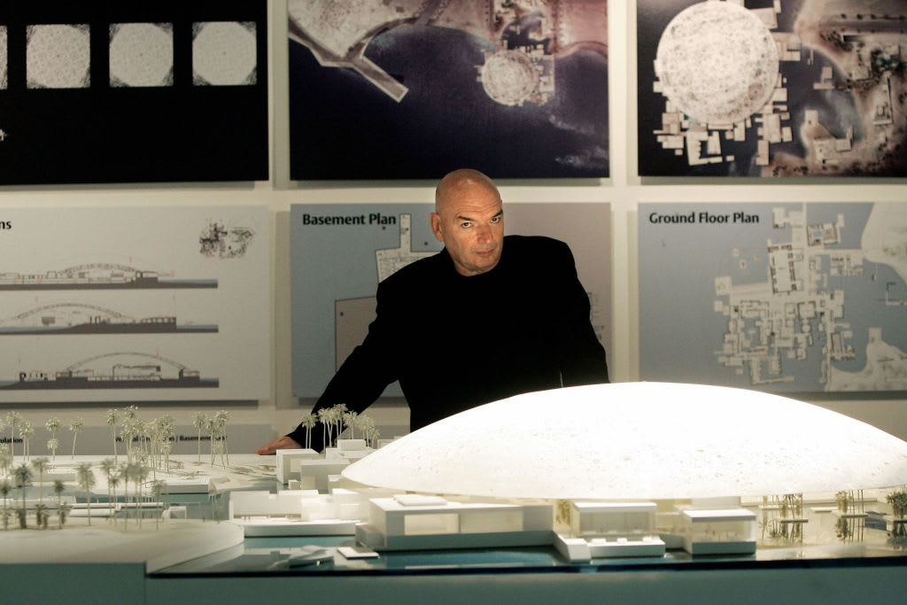 Abu Dhabi, UNITED ARAB EMIRATES: French architect Jean Nouvel poses next to the model of the futur