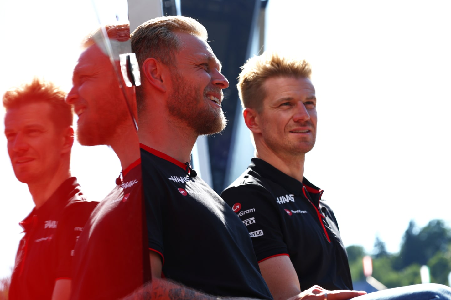 SPIELBERG, AUSTRIA - JUNE 29: Kevin Magnussen of Denmark and Haas F1 and Nico Hulkenberg of Germany