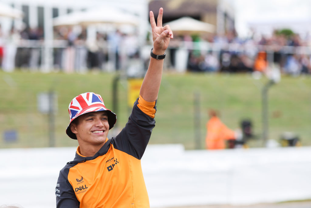 NORTHAMPTON, ENGLAND - JULY 03: Lando Norris of McLaren and Great Britain waves to the crowd during