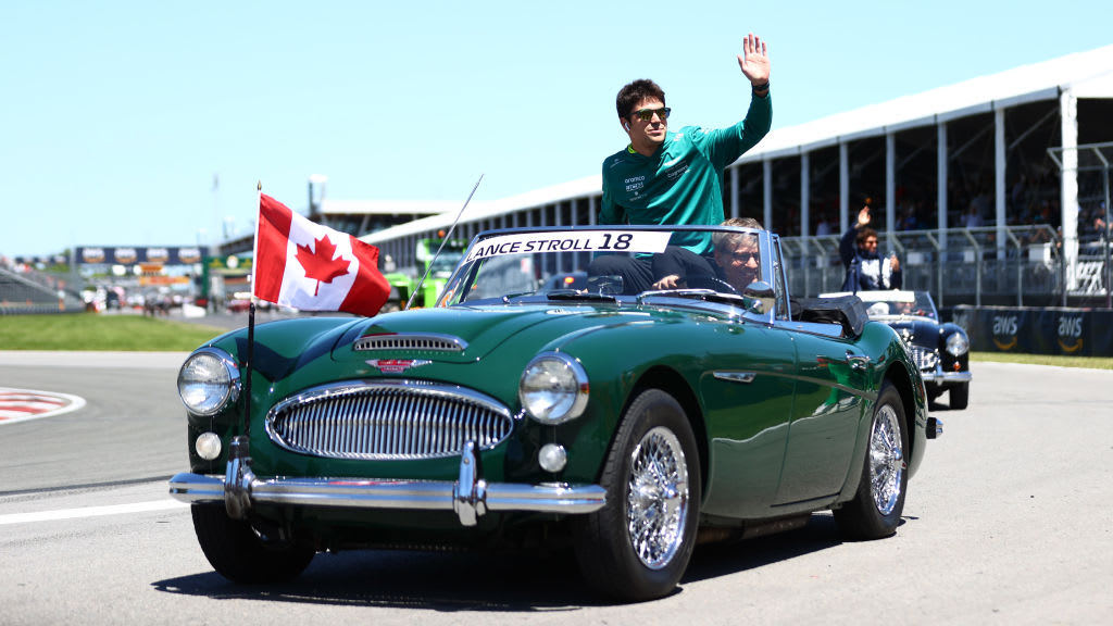 MONTREAL, QUEBEC - JUNE 19: Lance Stroll of Canada and Aston Martin F1 Team waves to the crowd on