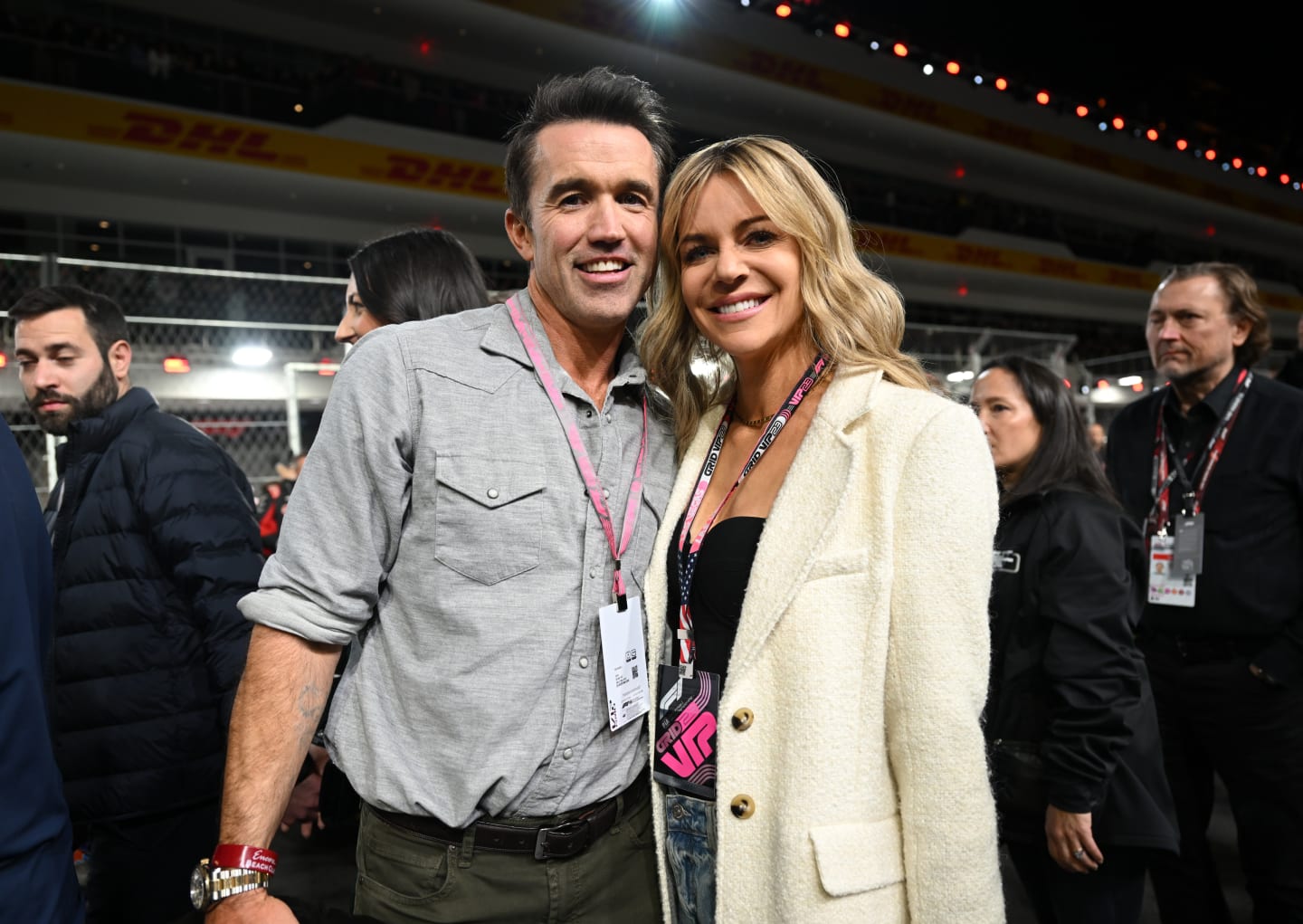 LAS VEGAS, NEVADA - NOVEMBER 18: Rob McElhenney and his wife Kaitlin Olson pose during the grid prior to the F1 Grand Prix of Las Vegas at Las Vegas Strip Circuit on November 18, 2023 in Las Vegas, Nevada, United States. (Photo by Tayfun Cokun/Anadolu via Getty Images)