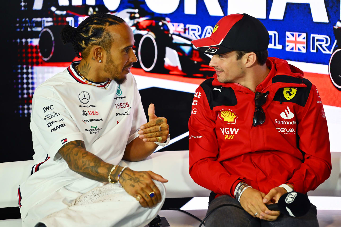 NORTHAMPTON, ENGLAND - JULY 06: Lewis Hamilton of Great Britain and Mercedes and Charles Leclerc of